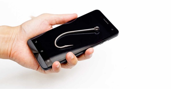 mobile phishing concept - a fish hook on a smart phone  Stock Foto: Bildnummer: 220097302  copyright by shutterstock.com